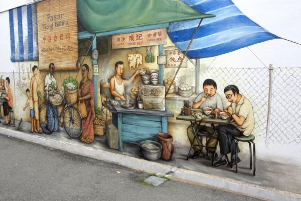 Graffiti art street mural of people shopping and eating.